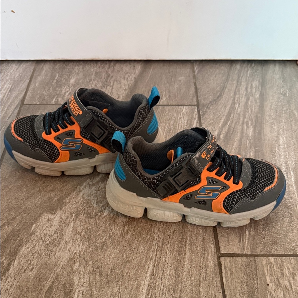 Skechers Kids' Black and Orange Sneakers with Blue Accents